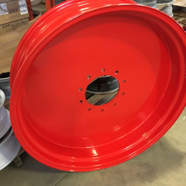 Large round and red metal object