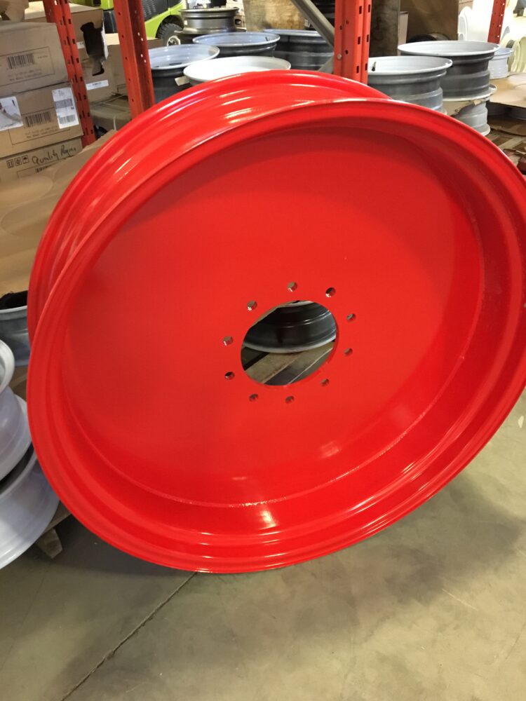 Large round and red metal object